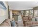 View from the living room towards the open kitchen and dining area, great for entertaining at 10748 Aldrovandi Dr, Las Vegas, NV 89141