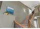 Open concept stairs with carpet and railing leading to the second story of the home at 10748 Aldrovandi Dr, Las Vegas, NV 89141