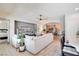 Comfortable living room with an open floor plan, stylish furnishings, and easy access to the kitchen at 10847 Intro Ave, Las Vegas, NV 89135