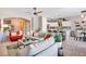 Inviting living room featuring stylish furnishings and an open layout connecting to the kitchen and dining areas at 10847 Intro Ave, Las Vegas, NV 89135