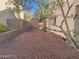 Backyard features include desert landscaping for low maintenance at 1297 Peppercorn Ave, Henderson, NV 89012