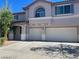 Charming two-story home with a two-car garage and a covered front porch at 1297 Peppercorn Ave, Henderson, NV 89012