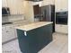 Kitchen with stainless steel appliances and a center island at 1297 Peppercorn Ave, Henderson, NV 89012