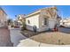 A single-story home featuring a well-manicured exterior with desert landscaping, a two-car garage and a walkway at 139 Serenade Ct, Henderson, NV 89074