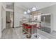Bright kitchen featuring a kitchen island with seating, stainless steel appliances, and ample storage at 139 Serenade Ct, Henderson, NV 89074