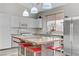 Modern kitchen featuring stainless steel appliances and a central island with seating at 139 Serenade Ct, Henderson, NV 89074