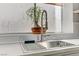 Close-up of kitchen sink with modern faucet and a bright window at 139 Serenade Ct, Henderson, NV 89074
