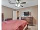 Bedroom with neutral carpet, ceiling fan, and dresser at 1457 Summer Glow Ave, Henderson, NV 89012