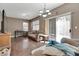 Open living area with hard floors, sliding door to backyard and casual furniture at 1457 Summer Glow Ave, Henderson, NV 89012