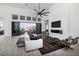 Bright open living room with sliding glass doors and scenic outdoor views at 148 Tre Pietre St, Henderson, NV 89011