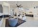 Open-concept living room showcasing modern design, seamless flow to the kitchen, and stylish decor at 148 Tre Pietre St, Henderson, NV 89011