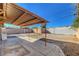 Backyard featuring a large covered patio and block wall fencing at 1906 Palora Ave, Las Vegas, NV 89169