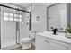 Updated bathroom featuring a glass shower door, modern finishes, and vanity at 1906 Palora Ave, Las Vegas, NV 89169