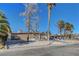 Single-story home features desert landscaping, a front yard, and a well-maintained exterior at 1906 Palora Ave, Las Vegas, NV 89169