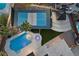Aerial view showcases a pool, pickleball court, gazebo, and landscaped backyard at 1912 Calanda Ct, Las Vegas, NV 89102