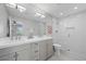 Bright bathroom boasts double sinks and modern fixtures with a shower at 1912 Calanda Ct, Las Vegas, NV 89102