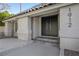 Front entrance view of a home featuring a double-door entry and modern house numbers at 1912 Calanda Ct, Las Vegas, NV 89102