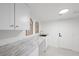 Bright laundry room with ample counter space and decorative wall accents at 1912 Calanda Ct, Las Vegas, NV 89102
