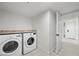 Well-equipped laundry room with modern washer and dryer units and a clean design at 1912 Calanda Ct, Las Vegas, NV 89102