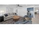 Comfortable living area with stylish furniture, a cozy seating arrangement, and a bar area at 1912 Calanda Ct, Las Vegas, NV 89102