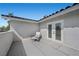 Relaxing outdoor patio with comfortable lounge chair, perfect for enjoying sunny days at 1912 Calanda Ct, Las Vegas, NV 89102