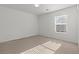 Bright bedroom featuring plush carpet, a modern ceiling fan and neutral walls at 2624 Courlan Dr, North Las Vegas, NV 89084