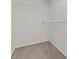Empty walk-in closet with neutral carpet at 2624 Courlan Dr, North Las Vegas, NV 89084