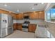 Lovely kitchen featuring stainless steel appliances, granite countertops, and ample cabinet space at 2624 Courlan Dr, North Las Vegas, NV 89084