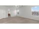 Main bedroom featuring natural light and an attached bathroom at 2624 Courlan Dr, North Las Vegas, NV 89084