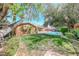 Lush backyard with a sparkling pool, mature trees, and inviting outdoor space at 2809 Gilmary Ave, Las Vegas, NV 89102