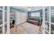 Versatile bedroom with a sofa, closet, and ample natural light, suitable for guests, a home office, or a cozy den at 2809 Gilmary Ave, Las Vegas, NV 89102