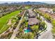 Luxury homes line a golf course with stunning mountain views, providing an idyllic setting at 2994 San Lorenzo Ct, Henderson, NV 89052