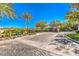 Welcoming gated-community entrance with lush landscaping and serene views of the surrounding neighborhood at 2994 San Lorenzo Ct, Henderson, NV 89052
