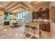 Sophisticated dining area with custom cabinets, bar, and modern décor at 2994 San Lorenzo Ct, Henderson, NV 89052