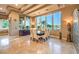 Bright dining room with large windows, tray ceilings and statement lighting features at 2994 San Lorenzo Ct, Henderson, NV 89052