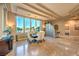 Elegant dining area with a large window, decorative lighting, and stylish bar at 2994 San Lorenzo Ct, Henderson, NV 89052