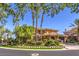 Mediterranean-style home with a circular driveway, mature landscaping and a three-car garage at 2994 San Lorenzo Ct, Henderson, NV 89052