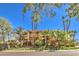 Large Mediterranean style home with mature landscaping and a gated entrance at 2994 San Lorenzo Ct, Henderson, NV 89052