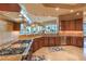 Large kitchen featuring stainless steel appliances, custom cabinetry, and travertine floors at 2994 San Lorenzo Ct, Henderson, NV 89052