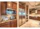 Gourmet kitchen features stainless steel appliances, custom cabinetry, and stone countertops, designed for culinary excellence at 2994 San Lorenzo Ct, Henderson, NV 89052