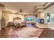 Luxurious primary suite featuring a fireplace, sitting area, and hardwood floors at 2994 San Lorenzo Ct, Henderson, NV 89052