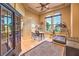 Home office with natural lighting, a ceiling fan and a treadmill at 2994 San Lorenzo Ct, Henderson, NV 89052