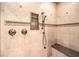 Shower with stone and built-in bench at 2994 San Lorenzo Ct, Henderson, NV 89052