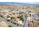 Expansive aerial shot showcasing the neighborhood, nearby mountains, and vast desert landscape at 3101 Margarita St, Pahrump, NV 89048