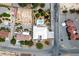 Expansive aerial view of a property with a pool, lush landscaping, and desert surroundings at 3101 Margarita St, Pahrump, NV 89048