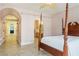 Bedroom showcasing an open archway, neutral paint, and tile flooring at 3101 Margarita St, Pahrump, NV 89048