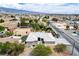 An eye-level view of the property with a pool and surrounding desert landscape at 3101 Margarita St, Pahrump, NV 89048