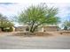 Charming front exterior with a circular driveway and desert landscaping at 3101 Margarita St, Pahrump, NV 89048