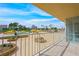 Balcony view overlooking a pool and city skyline at 3111 Bel Air Dr # 3C, Las Vegas, NV 89109