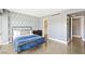 Stylish bedroom featuring a bold accent wall and polished concrete floors for a contemporary aesthetic at 3111 Bel Air Dr # 3C, Las Vegas, NV 89109